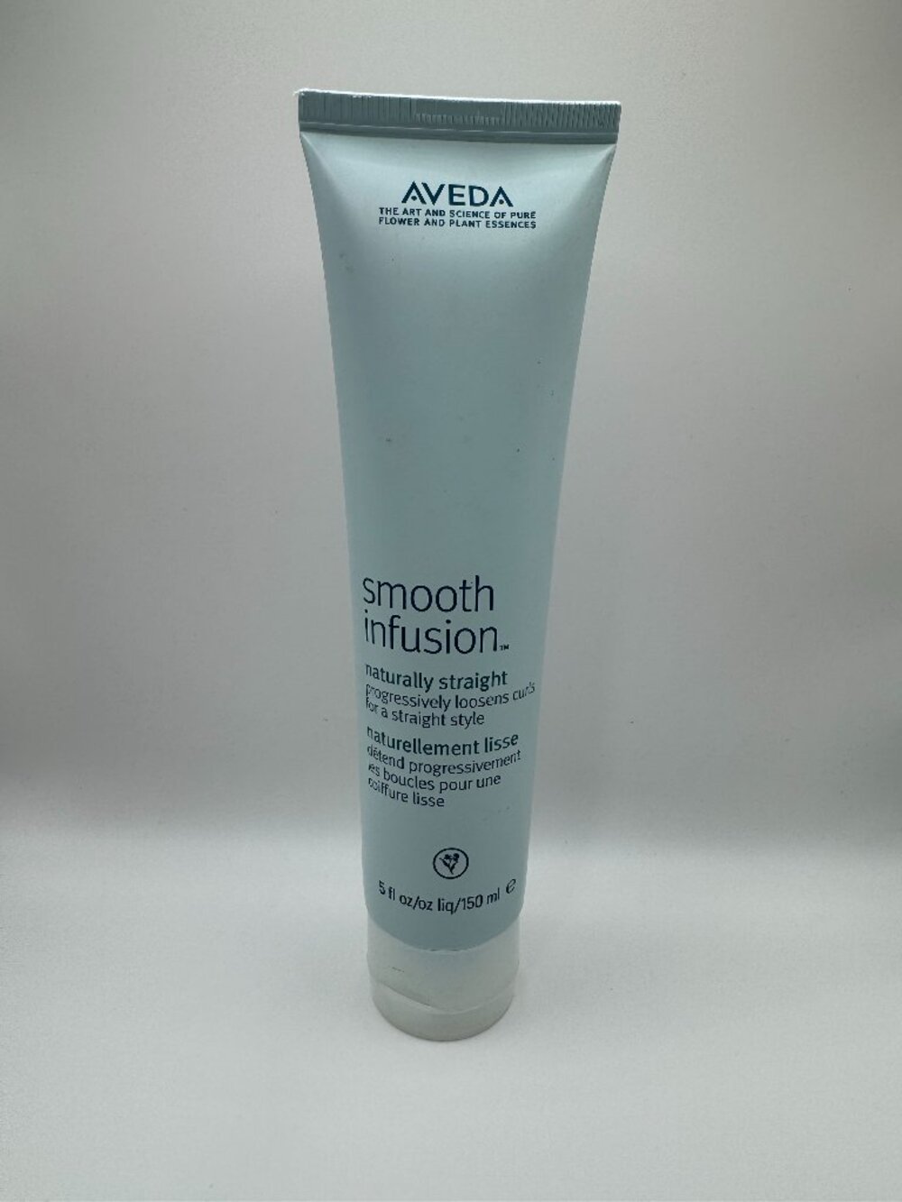 Aveda Smooth Infusion Naturally Straight 5 oz Loosens Curls for a Straight Style